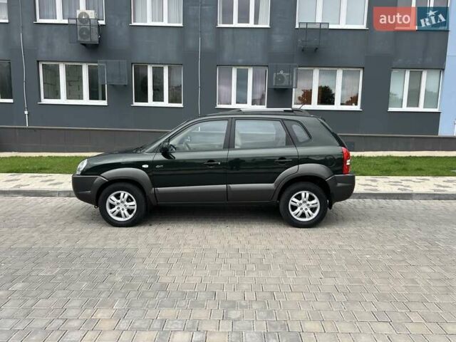 Зеленый Хендай Туксон, объемом двигателя 2 л и пробегом 82 тыс. км за 9950 $, фото 4 на Automoto.ua