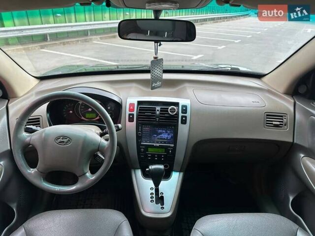 Зеленый Хендай Туксон, объемом двигателя 1.99 л и пробегом 214 тыс. км за 7990 $, фото 12 на Automoto.ua