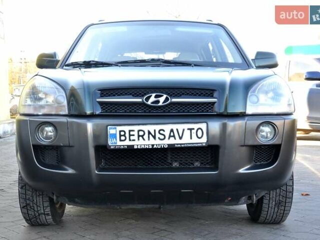 Зеленый Хендай Туксон, объемом двигателя 1.98 л и пробегом 245 тыс. км за 7200 $, фото 4 на Automoto.ua