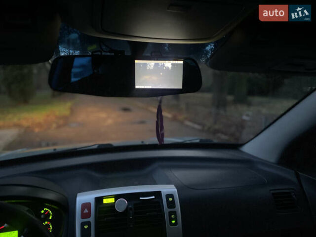 Зеленый Хендай Туксон, объемом двигателя 2 л и пробегом 223 тыс. км за 7950 $, фото 17 на Automoto.ua