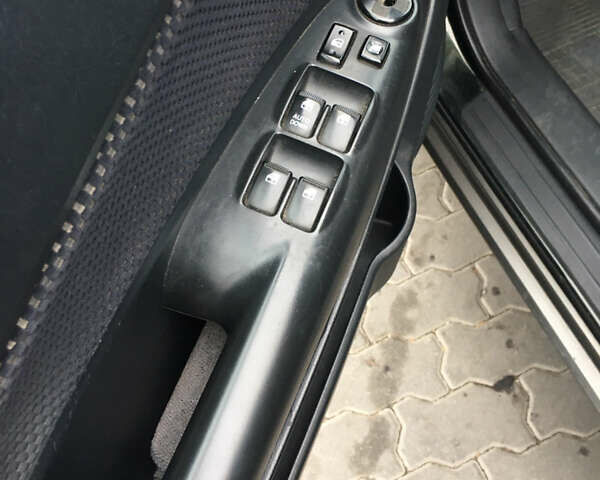 Зеленый Хендай Туксон, объемом двигателя 2 л и пробегом 223 тыс. км за 8500 $, фото 18 на Automoto.ua