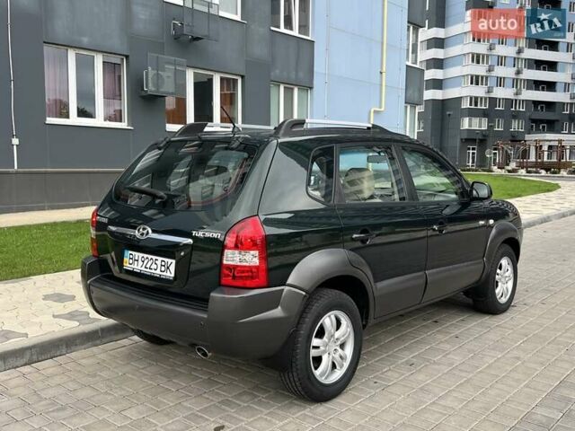 Зеленый Хендай Туксон, объемом двигателя 2 л и пробегом 82 тыс. км за 9950 $, фото 28 на Automoto.ua