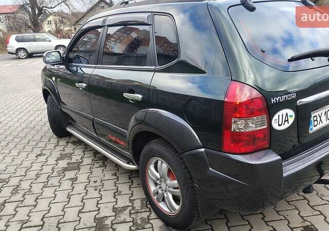 Зелений Хендай Туксон, об'ємом двигуна 1.98 л та пробігом 245 тис. км за 7800 $, фото 7 на Automoto.ua