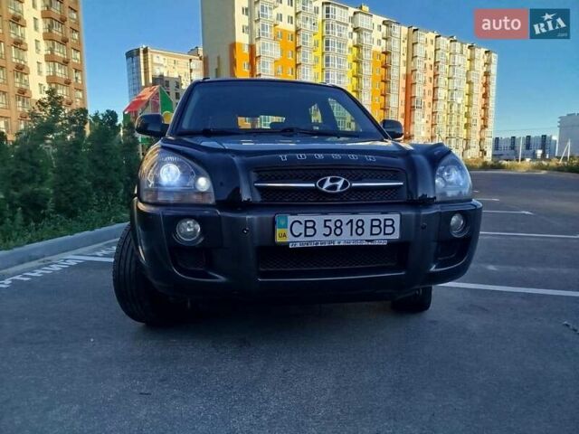 Зелений Хендай Туксон, об'ємом двигуна 1.98 л та пробігом 185 тис. км за 8100 $, фото 10 на Automoto.ua