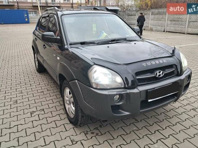 Зеленый Хендай Туксон, объемом двигателя 1.98 л и пробегом 280 тыс. км за 7200 $, фото 11 на Automoto.ua