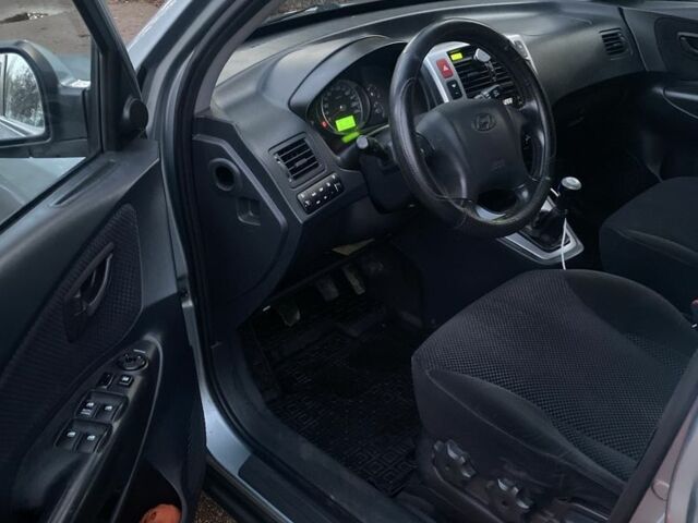 Зеленый Хендай Туксон, объемом двигателя 2 л и пробегом 223 тыс. км за 7950 $, фото 7 на Automoto.ua