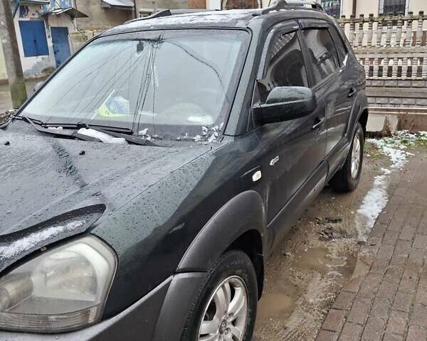 Зелений Хендай Туксон, об'ємом двигуна 1.98 л та пробігом 280 тис. км за 8500 $, фото 6 на Automoto.ua
