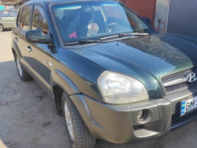 Зеленый Хендай Туксон, объемом двигателя 2 л и пробегом 189 тыс. км за 8500 $, фото 5 на Automoto.ua