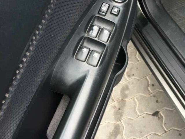 Зеленый Хендай Туксон, объемом двигателя 2 л и пробегом 223 тыс. км за 8500 $, фото 6 на Automoto.ua