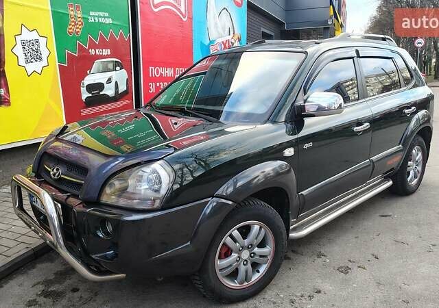 Зелений Хендай Туксон, об'ємом двигуна 1.98 л та пробігом 245 тис. км за 7800 $, фото 2 на Automoto.ua