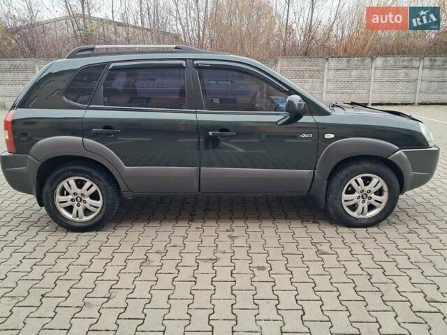 Зеленый Хендай Туксон, объемом двигателя 1.98 л и пробегом 280 тыс. км за 7200 $, фото 8 на Automoto.ua