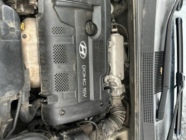 Зеленый Хендай Туксон, объемом двигателя 2 л и пробегом 190 тыс. км за 6150 $, фото 22 на Automoto.ua