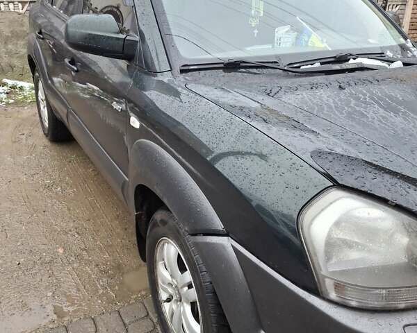 Зелений Хендай Туксон, об'ємом двигуна 1.98 л та пробігом 280 тис. км за 8500 $, фото 4 на Automoto.ua