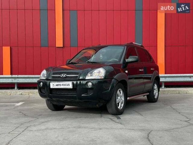 Зеленый Хендай Туксон, объемом двигателя 1.99 л и пробегом 214 тыс. км за 7990 $, фото 3 на Automoto.ua