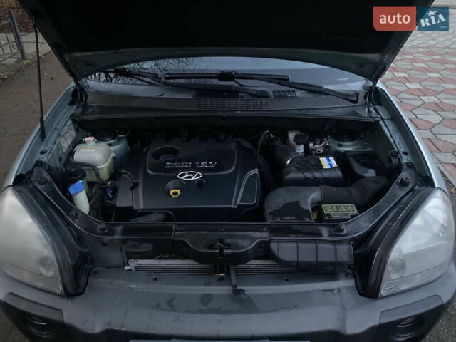 Зеленый Хендай Туксон, объемом двигателя 2 л и пробегом 223 тыс. км за 7950 $, фото 14 на Automoto.ua