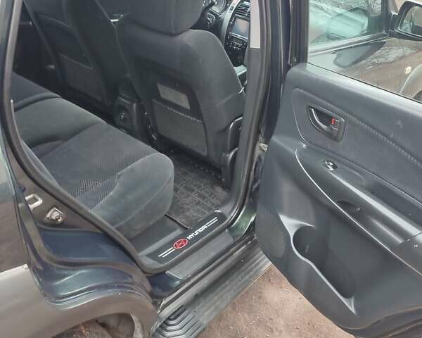 Зеленый Хендай Туксон, объемом двигателя 2 л и пробегом 213 тыс. км за 6500 $, фото 11 на Automoto.ua