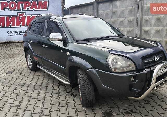 Зелений Хендай Туксон, об'ємом двигуна 1.98 л та пробігом 245 тис. км за 7800 $, фото 15 на Automoto.ua