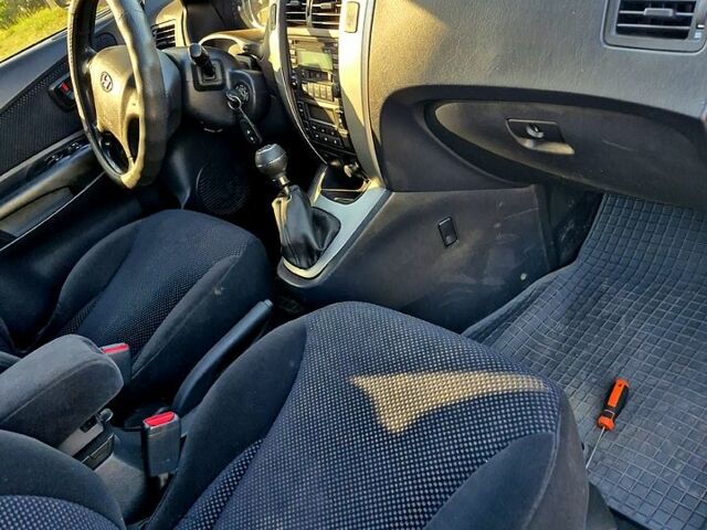 Зеленый Хендай Туксон, объемом двигателя 2 л и пробегом 135 тыс. км за 8500 $, фото 2 на Automoto.ua