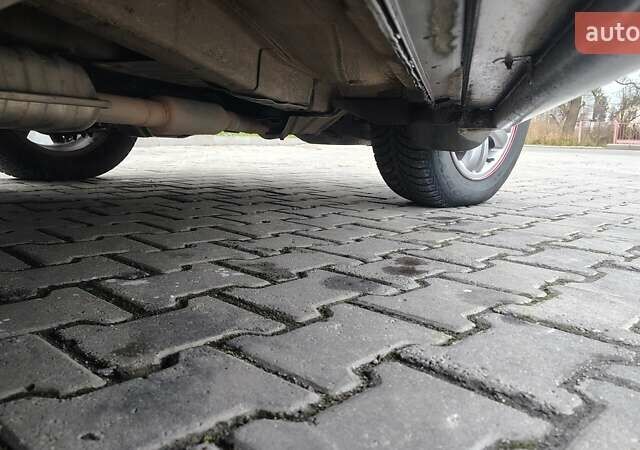 Зелений Хендай Туксон, об'ємом двигуна 1.98 л та пробігом 245 тис. км за 7800 $, фото 9 на Automoto.ua