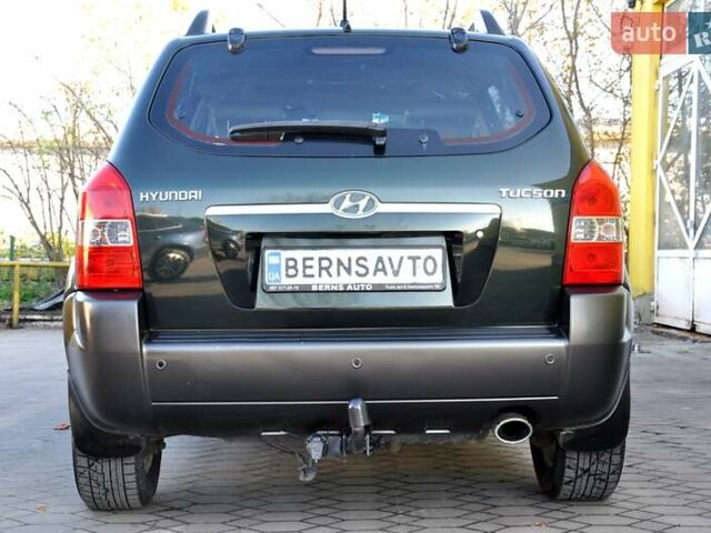 Зеленый Хендай Туксон, объемом двигателя 1.98 л и пробегом 245 тыс. км за 7200 $, фото 10 на Automoto.ua