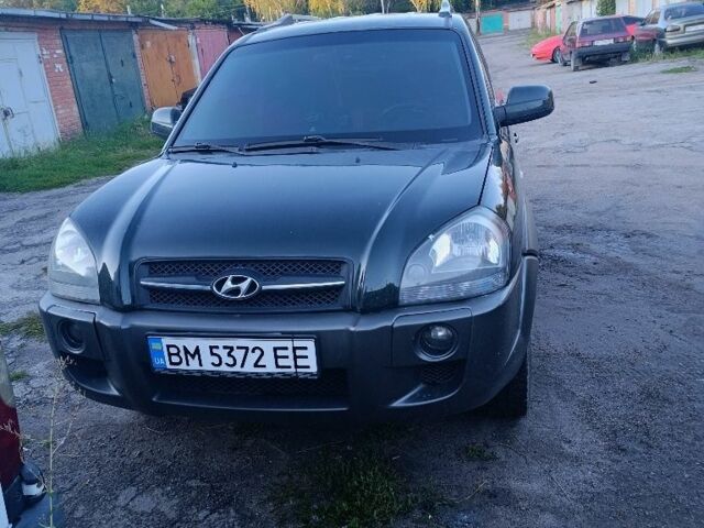 Зеленый Хендай Туксон, объемом двигателя 2 л и пробегом 189 тыс. км за 8500 $, фото 3 на Automoto.ua