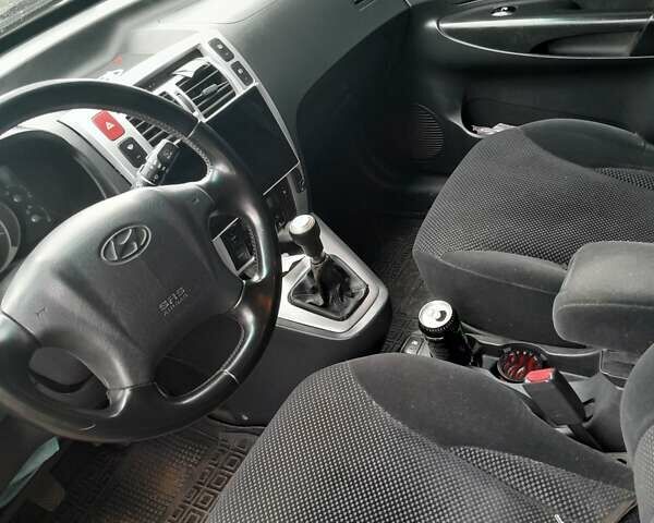 Зелений Хендай Туксон, об'ємом двигуна 2 л та пробігом 230 тис. км за 8100 $, фото 1 на Automoto.ua
