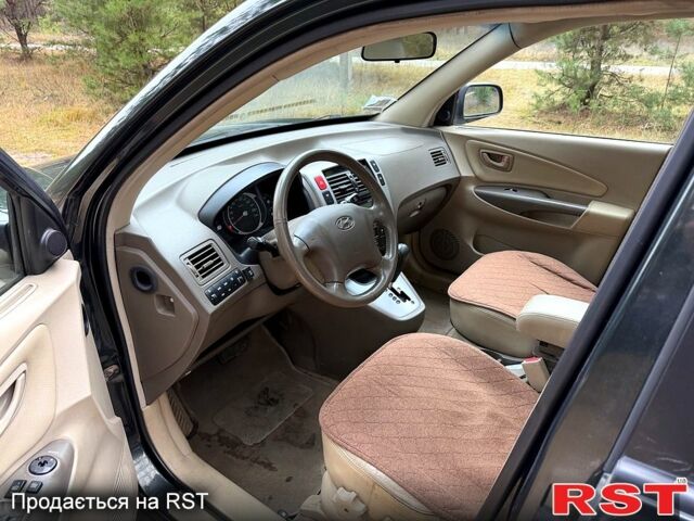 Зеленый Хендай Туксон, объемом двигателя 2 л и пробегом 185 тыс. км за 7950 $, фото 10 на Automoto.ua