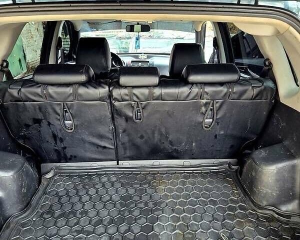 Зелений Хендай Туксон, об'ємом двигуна 2 л та пробігом 276 тис. км за 9000 $, фото 7 на Automoto.ua