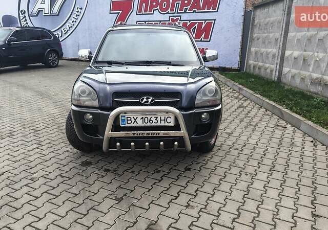 Зелений Хендай Туксон, об'ємом двигуна 1.98 л та пробігом 245 тис. км за 7800 $, фото 16 на Automoto.ua