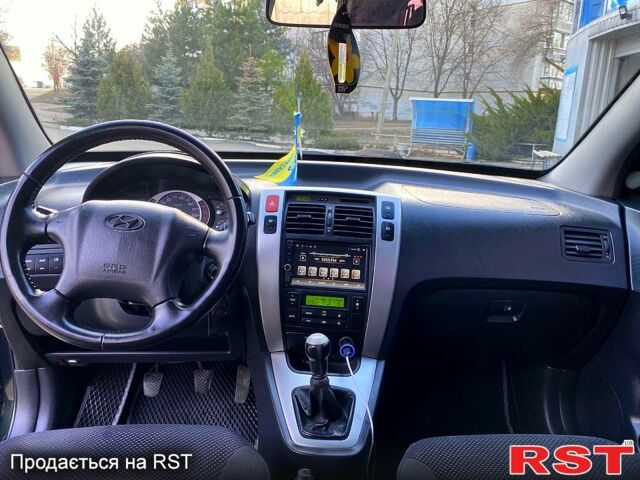 Зелений Хендай Туксон, об'ємом двигуна 2 л та пробігом 236 тис. км за 7600 $, фото 8 на Automoto.ua