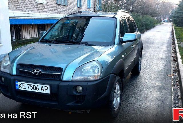 Зелений Хендай Туксон, об'ємом двигуна 2 л та пробігом 227 тис. км за 7800 $, фото 10 на Automoto.ua