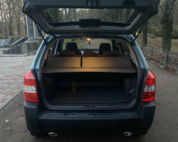 Зеленый Хендай Туксон, объемом двигателя 2 л и пробегом 223 тыс. км за 7950 $, фото 13 на Automoto.ua