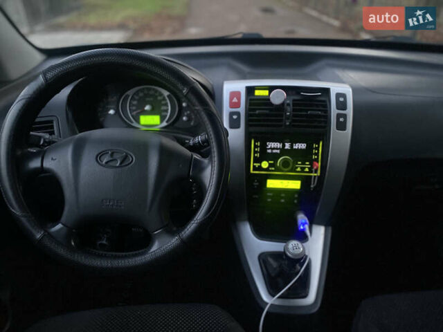 Зеленый Хендай Туксон, объемом двигателя 2 л и пробегом 223 тыс. км за 7950 $, фото 23 на Automoto.ua