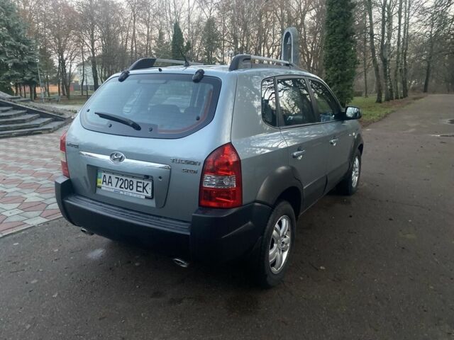 Зеленый Хендай Туксон, объемом двигателя 2 л и пробегом 223 тыс. км за 7950 $, фото 3 на Automoto.ua