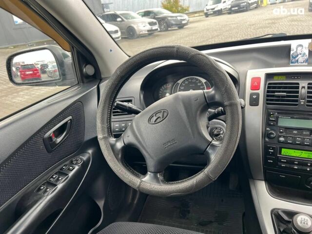 Зеленый Хендай Туксон, объемом двигателя 2 л и пробегом 223 тыс. км за 8540 $, фото 38 на Automoto.ua