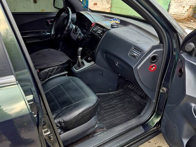 Зелений Хендай Туксон, об'ємом двигуна 2 л та пробігом 276 тис. км за 9000 $, фото 3 на Automoto.ua