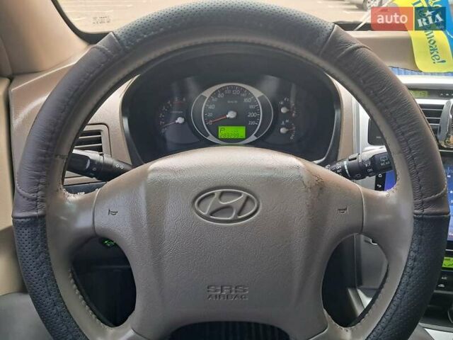 Зеленый Хендай Туксон, объемом двигателя 1.98 л и пробегом 280 тыс. км за 7200 $, фото 16 на Automoto.ua