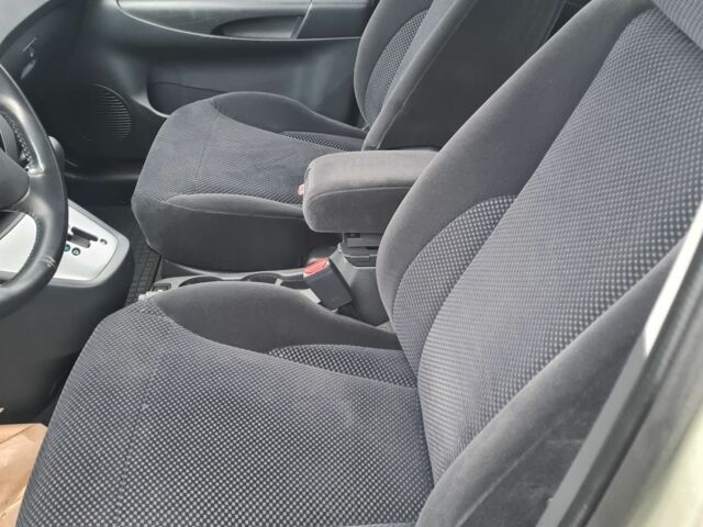 Зелений Хендай Туксон, об'ємом двигуна 2 л та пробігом 149 тис. км за 9900 $, фото 9 на Automoto.ua