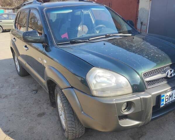 Зелений Хендай Туксон, об'ємом двигуна 1.98 л та пробігом 189 тис. км за 8500 $, фото 2 на Automoto.ua