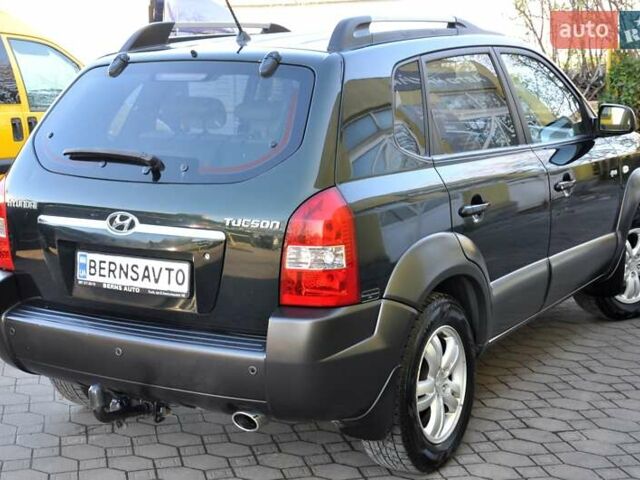 Зеленый Хендай Туксон, объемом двигателя 1.98 л и пробегом 245 тыс. км за 7200 $, фото 39 на Automoto.ua