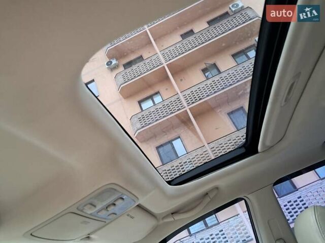 Зеленый Хендай Туксон, объемом двигателя 1.98 л и пробегом 280 тыс. км за 7200 $, фото 15 на Automoto.ua