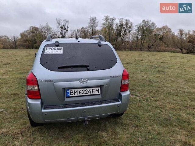 Зеленый Хендай Туксон, объемом двигателя 1.98 л и пробегом 129 тыс. км за 9200 $, фото 10 на Automoto.ua