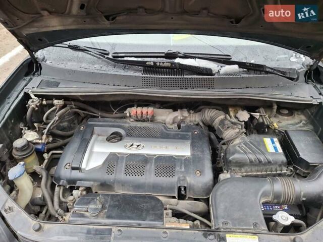 Зелений Хендай Туксон, об'ємом двигуна 1.98 л та пробігом 280 тис. км за 8500 $, фото 21 на Automoto.ua