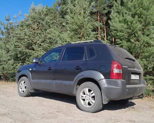Зелений Хендай Туксон, об'ємом двигуна 2 л та пробігом 230 тис. км за 8100 $, фото 5 на Automoto.ua