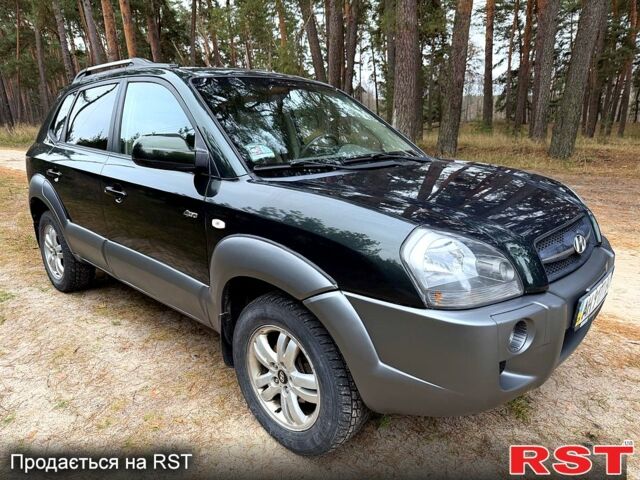 Зеленый Хендай Туксон, объемом двигателя 2 л и пробегом 185 тыс. км за 7950 $, фото 1 на Automoto.ua