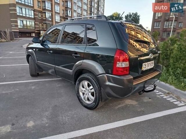Зелений Хендай Туксон, об'ємом двигуна 1.98 л та пробігом 185 тис. км за 8100 $, фото 7 на Automoto.ua