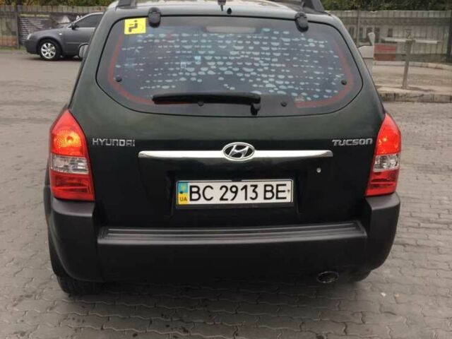 Зеленый Хендай Туксон, объемом двигателя 2 л и пробегом 223 тыс. км за 8500 $, фото 2 на Automoto.ua