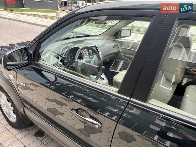Зеленый Хендай Туксон, объемом двигателя 2 л и пробегом 82 тыс. км за 9950 $, фото 55 на Automoto.ua