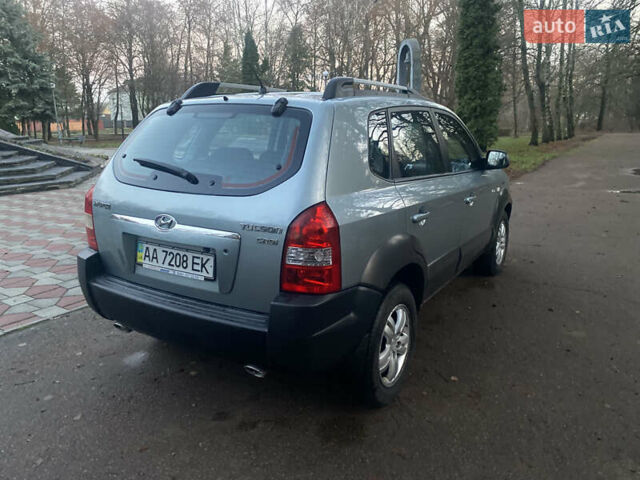 Зеленый Хендай Туксон, объемом двигателя 2 л и пробегом 223 тыс. км за 7950 $, фото 11 на Automoto.ua