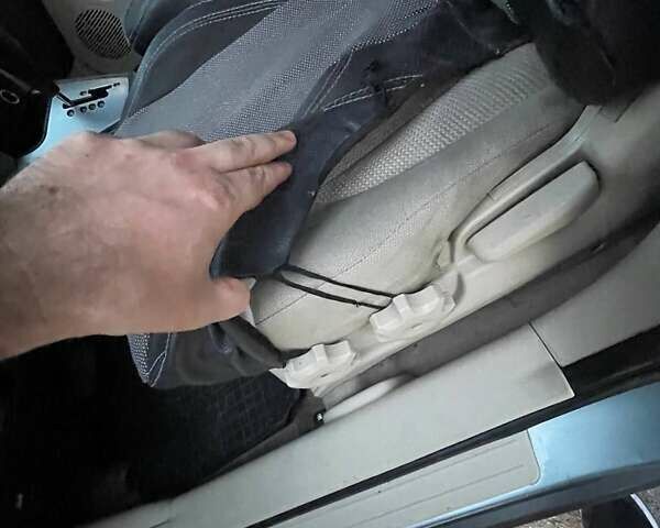 Зеленый Хендай Туксон, объемом двигателя 1.98 л и пробегом 205 тыс. км за 7700 $, фото 10 на Automoto.ua